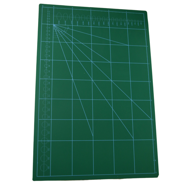 High-quality PVC cutting mat with measurement grids.